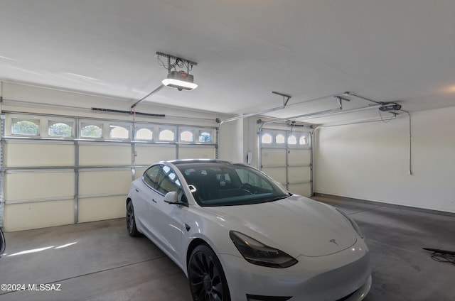 garage featuring a garage door opener