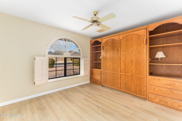 interior space featuring light hardwood / wood-style floors and ceiling fan