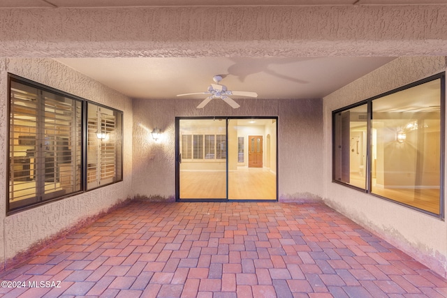 view of patio / terrace featuring ceiling fan