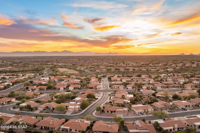 aerial view at dusk with a mountain view