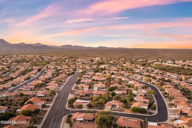 aerial view at dusk with a mountain view