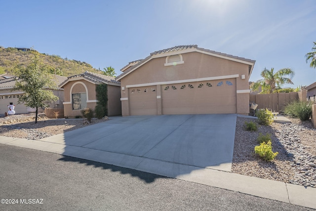 view of front of property featuring a garage