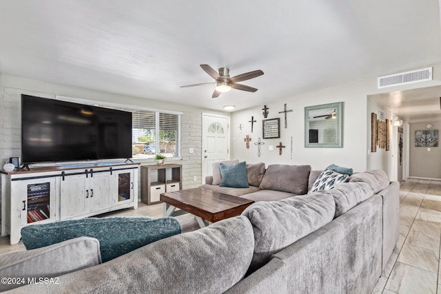 living room featuring ceiling fan