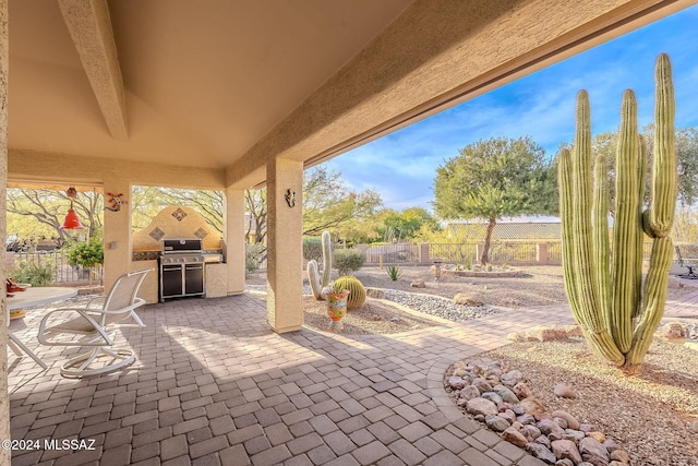 2435 E Mayview Dr, Green Valley, AZ 85614 - view of patio with a fenced backyard and a grill