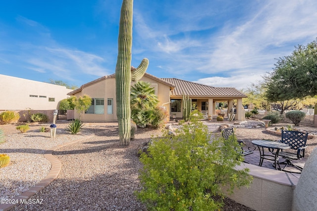 2435 E Mayview Dr, Green Valley, AZ 85614 - back of house featuring a patio area, stucco siding, and a tiled roof