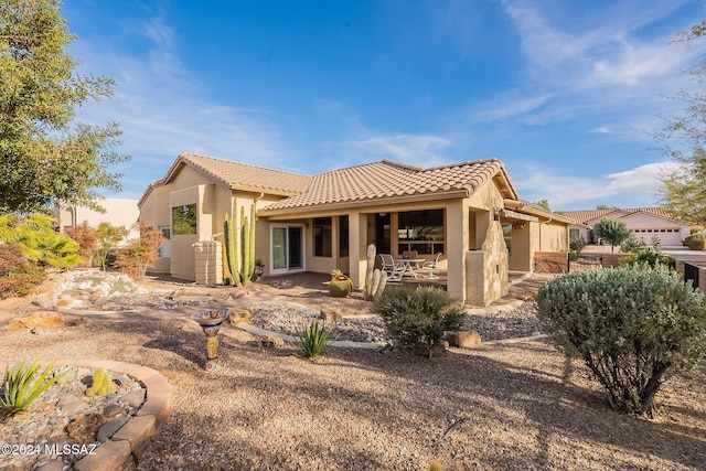 2435 E Mayview Dr, Green Valley, AZ 85614 - rear view of property with a tiled roof, stucco siding, and a patio