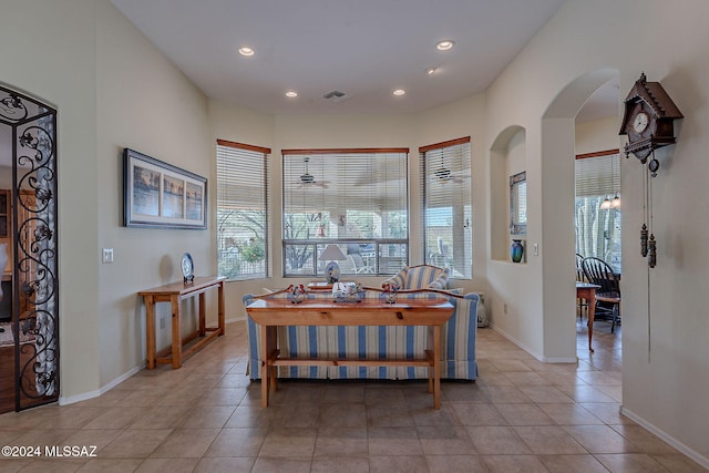 2435 E Mayview Dr, Green Valley, AZ 85614 - dining room featuring recessed lighting, arched walkways, light tile patterned floors, and baseboards