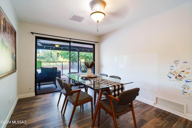 dining space with dark hardwood / wood-style floors and ceiling fan