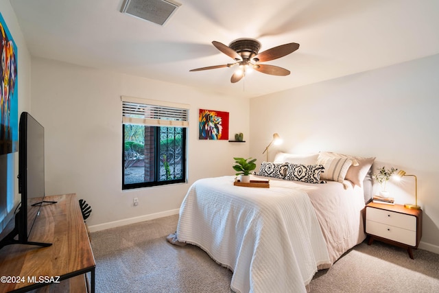 carpeted bedroom featuring ceiling fan