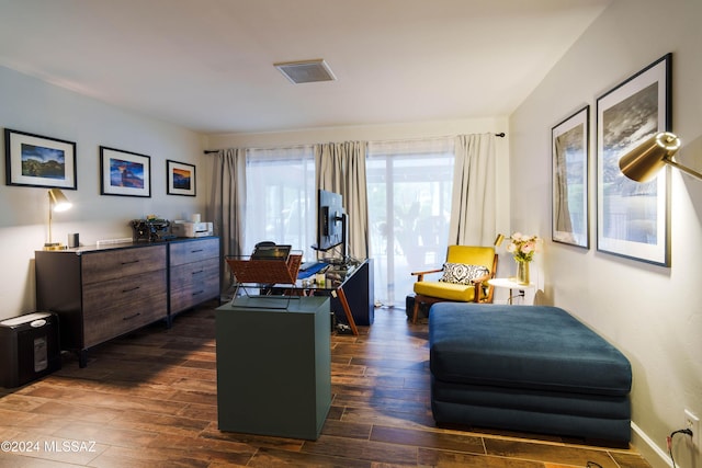 living area featuring dark hardwood / wood-style flooring