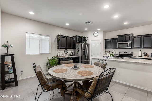 tiled dining space with sink