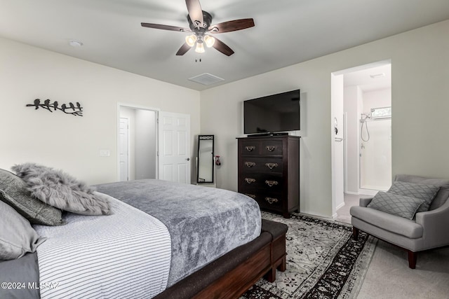 bedroom with ceiling fan and carpet floors