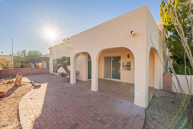 rear view of house featuring a patio area