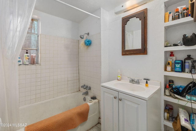 bathroom featuring vanity and shower / bath combo with shower curtain