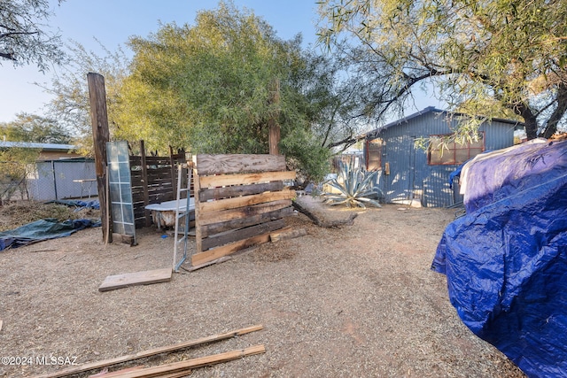 view of yard with an outdoor structure