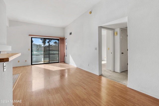 unfurnished living room featuring light wood-type flooring