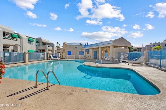 view of pool featuring a patio area