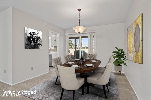 dining area with light tile patterned flooring