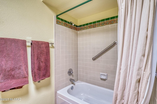 bathroom featuring shower / tub combo with curtain