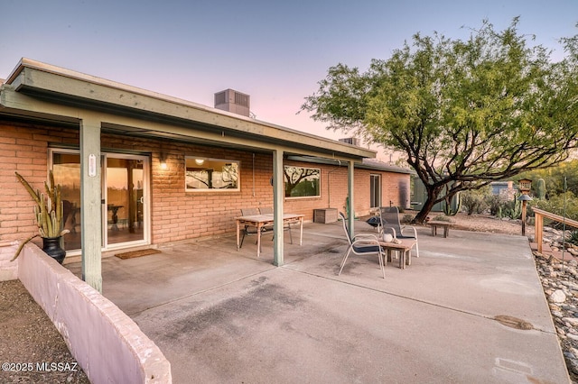 patio terrace at dusk with central AC