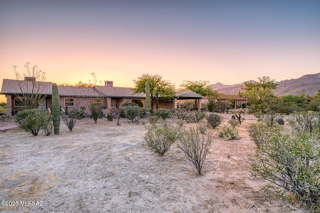 exterior space with a mountain view