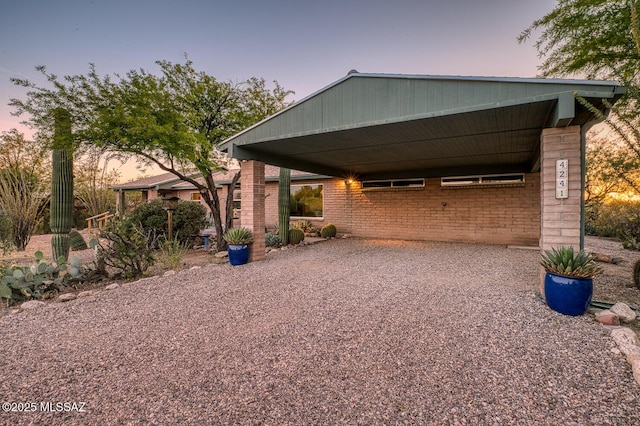 exterior space featuring a carport