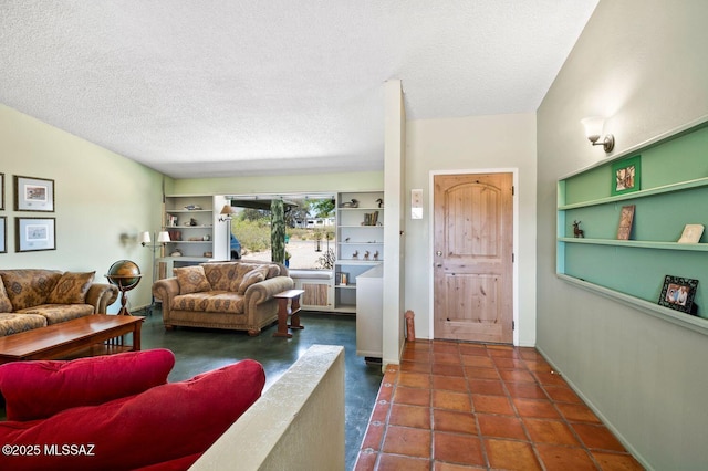 living room featuring a textured ceiling