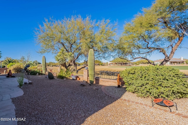 view of yard featuring fence