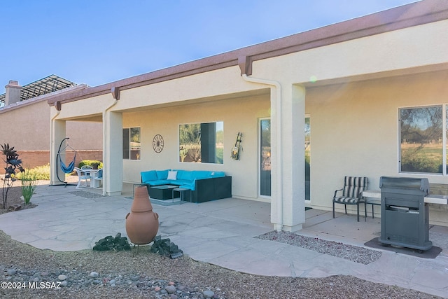 view of patio with an outdoor hangout area