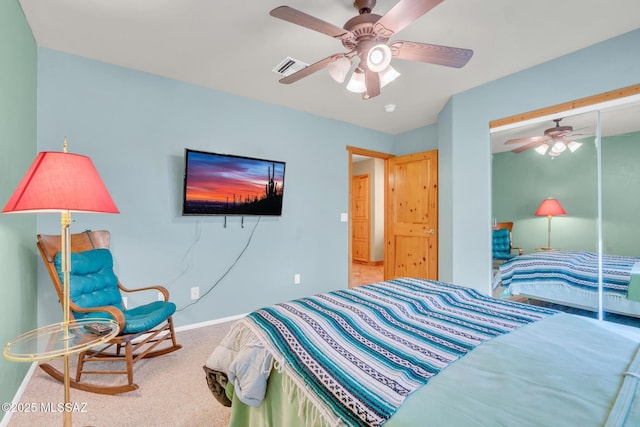 carpeted bedroom featuring ceiling fan