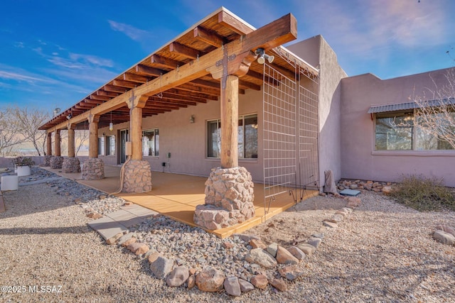 exterior space with a patio