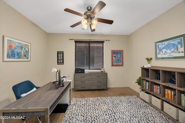 tiled office space with ceiling fan