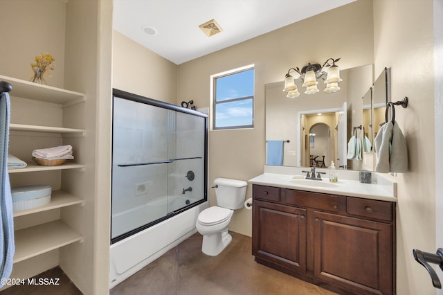 full bathroom featuring combined bath / shower with glass door, a notable chandelier, concrete floors, toilet, and vanity