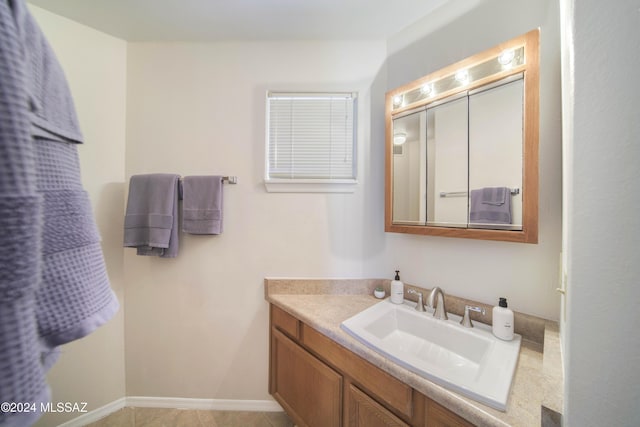 bathroom featuring vanity and tile patterned floors