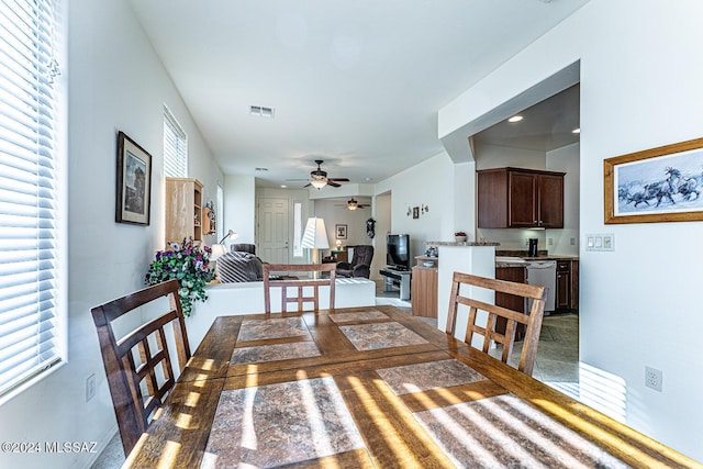 dining room with ceiling fan