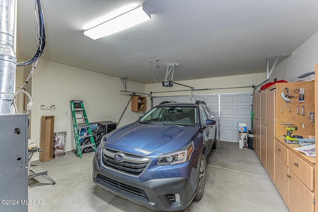 garage featuring a garage door opener