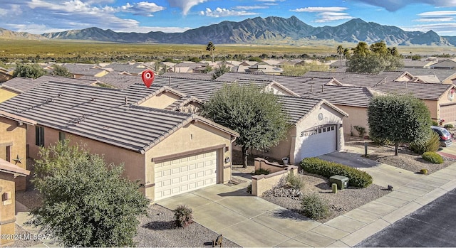 exterior space featuring a mountain view