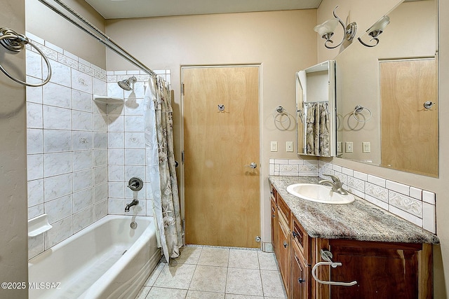 bathroom featuring tasteful backsplash, vanity, shower / bath combo, and tile patterned floors