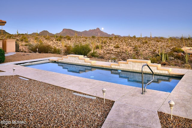 view of pool featuring a mountain view