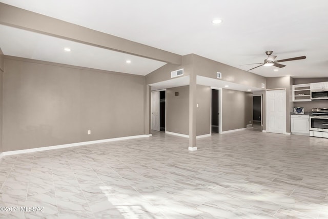 unfurnished living room with lofted ceiling with beams and ceiling fan