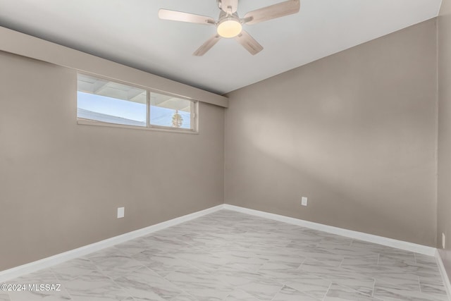 unfurnished room featuring ceiling fan