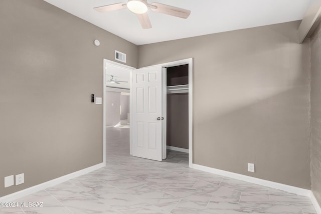 unfurnished bedroom featuring a closet and ceiling fan