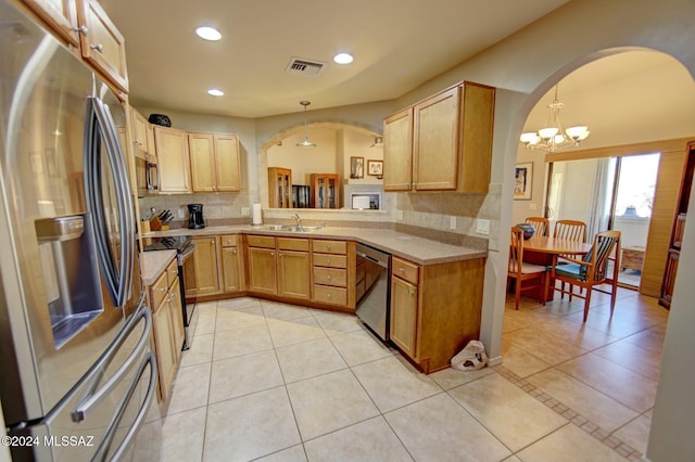 kitchen with visible vents, light countertops, light tile patterned floors, appliances with stainless steel finishes, and a sink