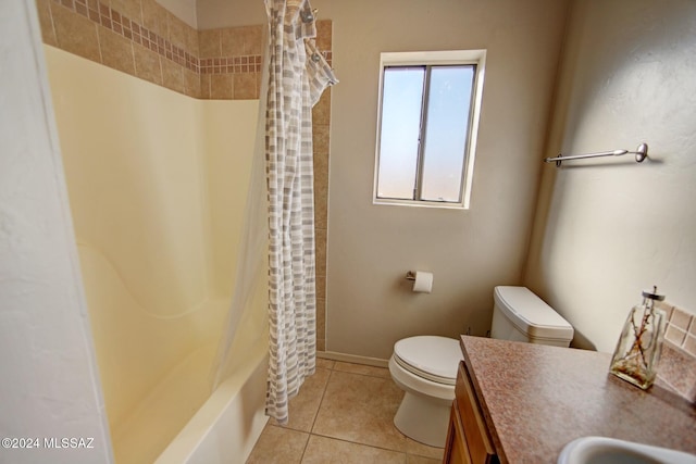 bathroom with tile patterned floors, toilet, and vanity