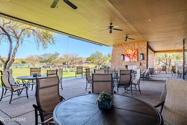 view of patio / terrace featuring ceiling fan