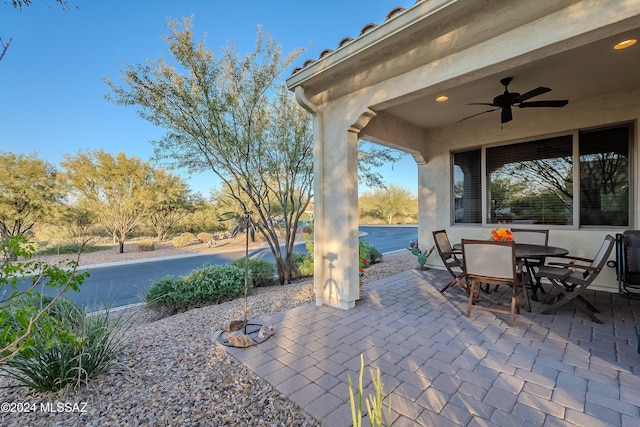 view of patio with ceiling fan