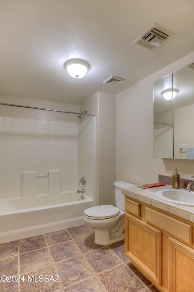 bathroom featuring visible vents, vanity, toilet, and tub / shower combination