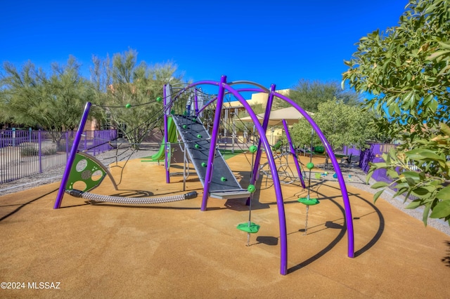 community playground featuring fence