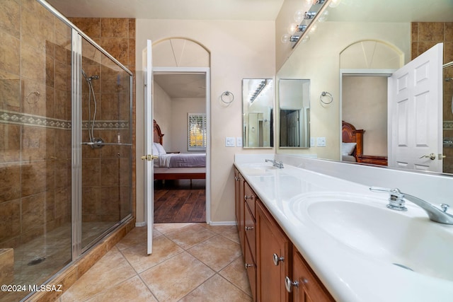 63506 E Harmony Dr, Tucson, AZ 85739 - bathroom featuring tile patterned flooring, vanity, and walk in shower