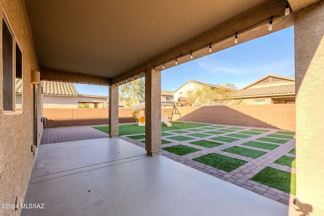 view of patio / terrace featuring a playground